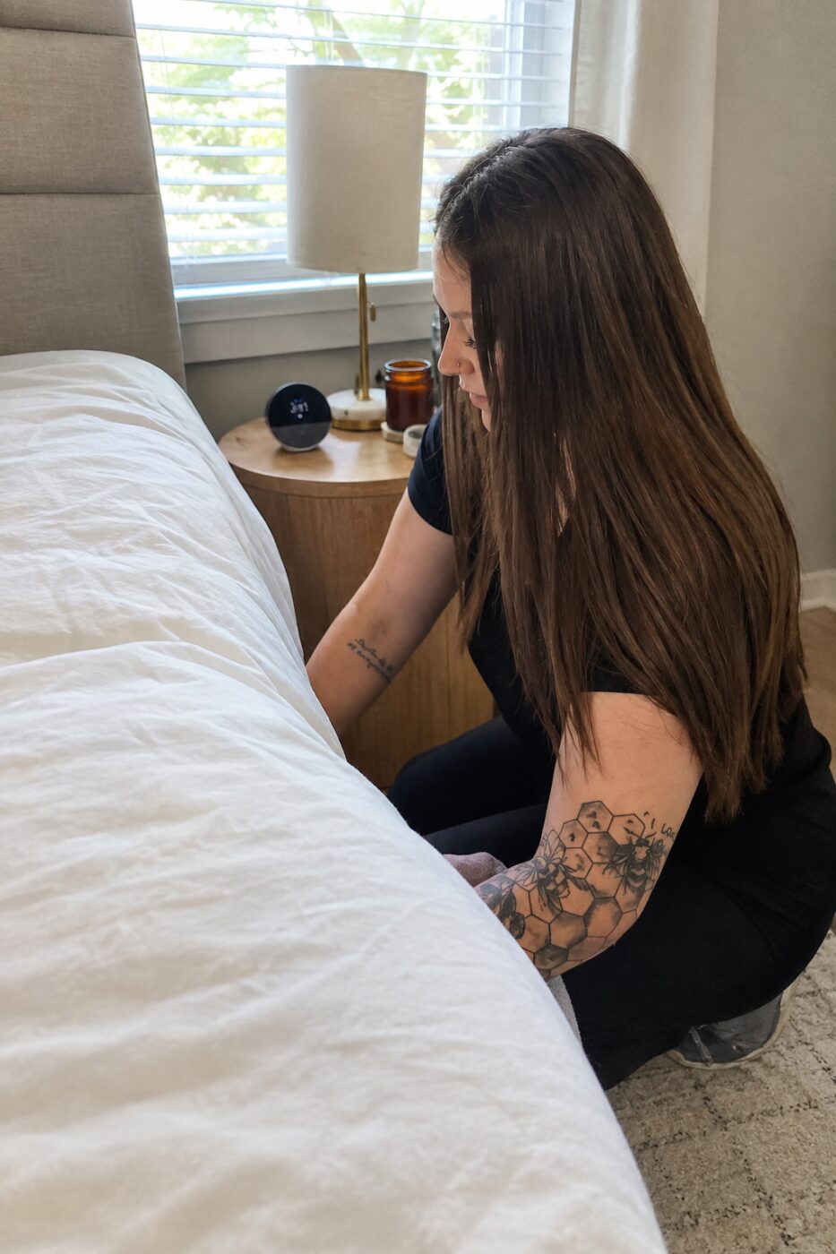 Harford 5 Star Cleaning technician making a bed